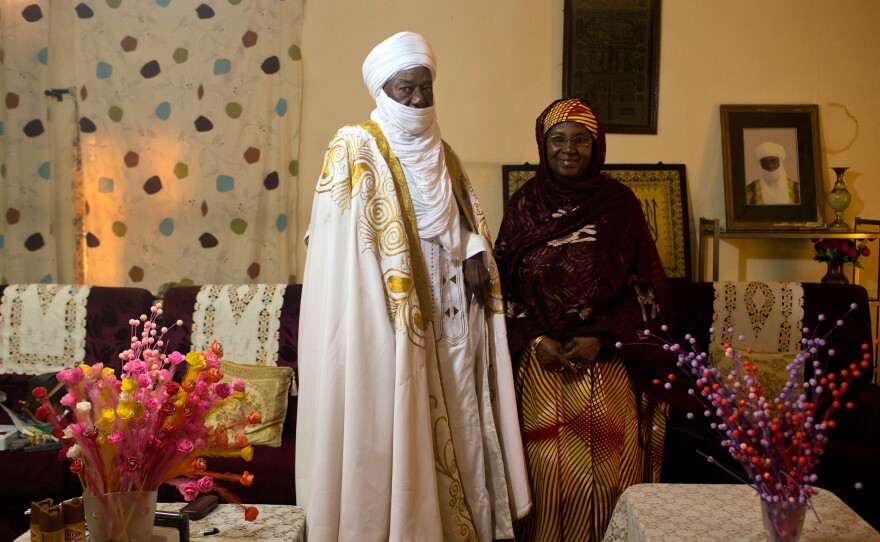 "Having a large family was seen as a gift of God," says 92-year-old Maidanda Saidou, the "sultan" of the region of Dosso. He's pictured above with his wife at home.