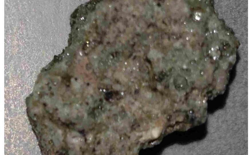 A sample of trinitite is seen in this undated photo.