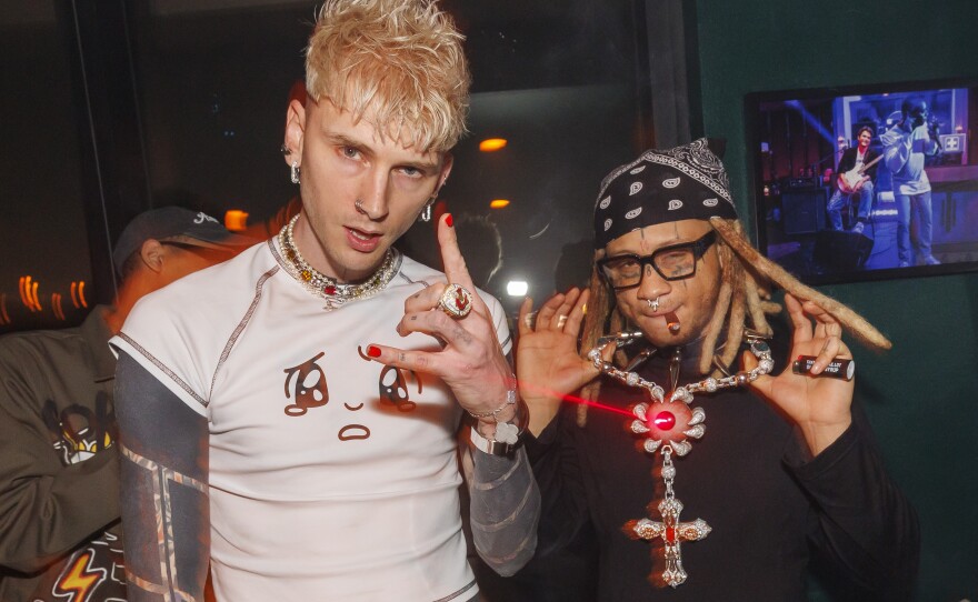 MGK (Machine Gun Kelly) and Trippie Redd at the March 21 listening party for their collaborative EP, g<em>enre : sadboy</em>, at Harriet's Rooftop in West Hollywood.