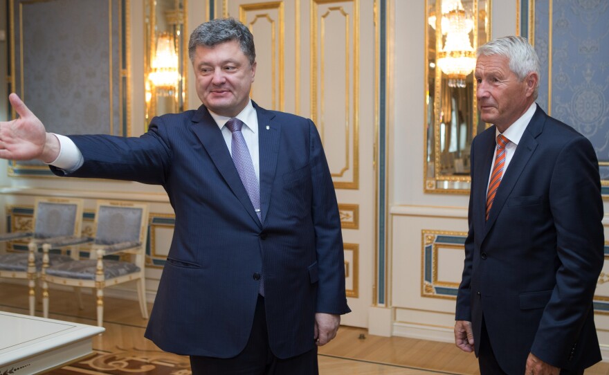 Ukrainian President Petro Poroshenko, left, welcomes Secretary-General of the Council of Europe Thorbjorn Jagland during a meeting in Kiev on Monday.