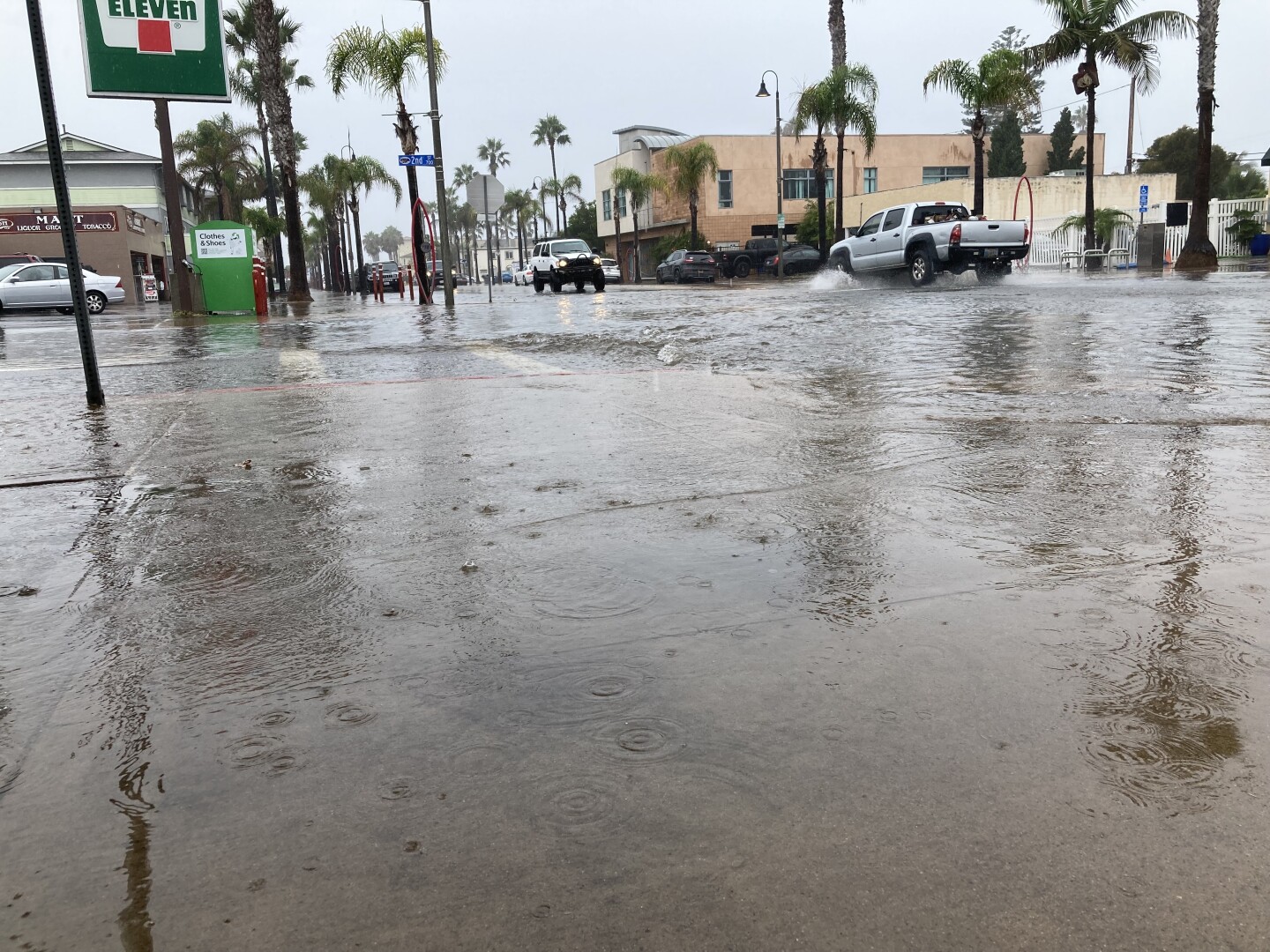 Water collects in front of this 7-Eleven store in Imperial Beach on Aug. 20, 2023