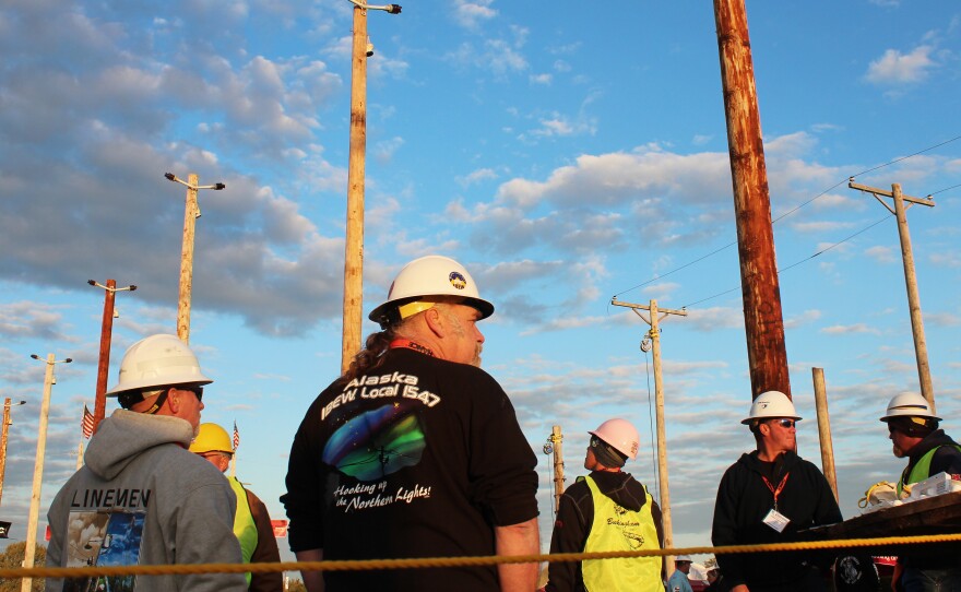 Linemen from across the country gather before the Lineman's Rodeo starts in Bonner Springs, Kan.