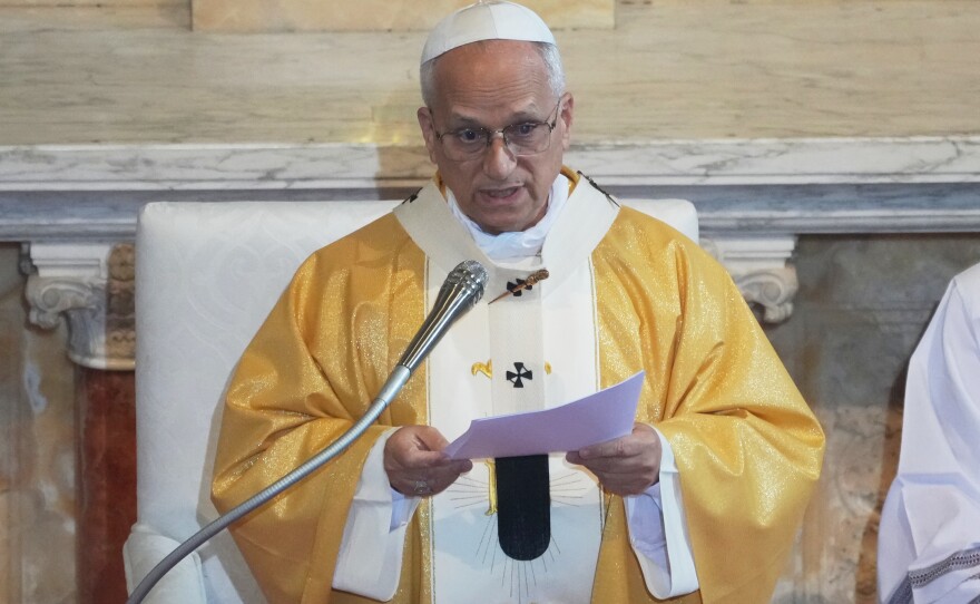 Pope Leo XIV delivers his speech as he celebrates a Mass in the Saint Augustine Basilica in Annaba, Algeria, Tuesday, April 14, 2026, on the second day of an 11-day apostolic journey to Africa.