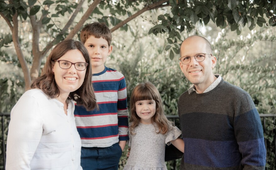 Tim Barounis (from right) his wife, Kya, and their children Simon, and Odessa in an undated family photo.