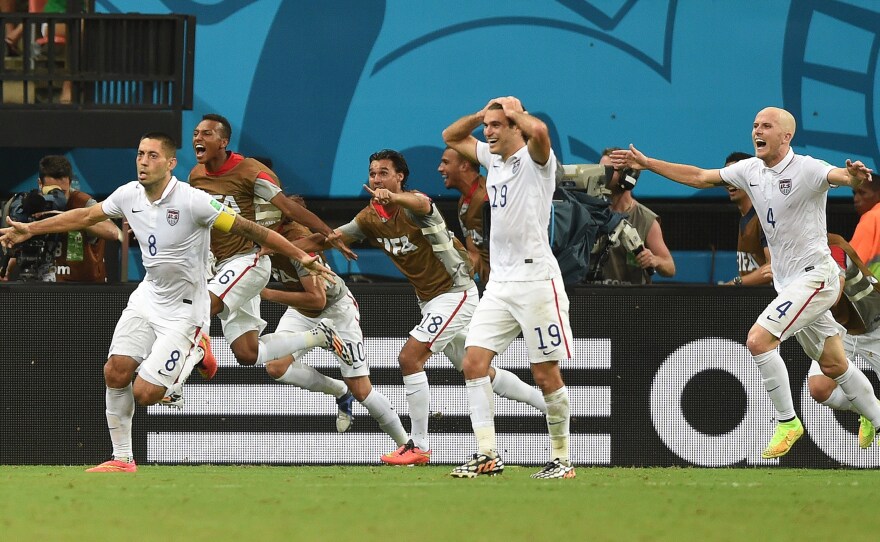 U.S. forward Clint Dempsey (8) celebrates after scoring his team's second goal during a match against Portugal at the Amazonia Arena in Manaus on Sunday.