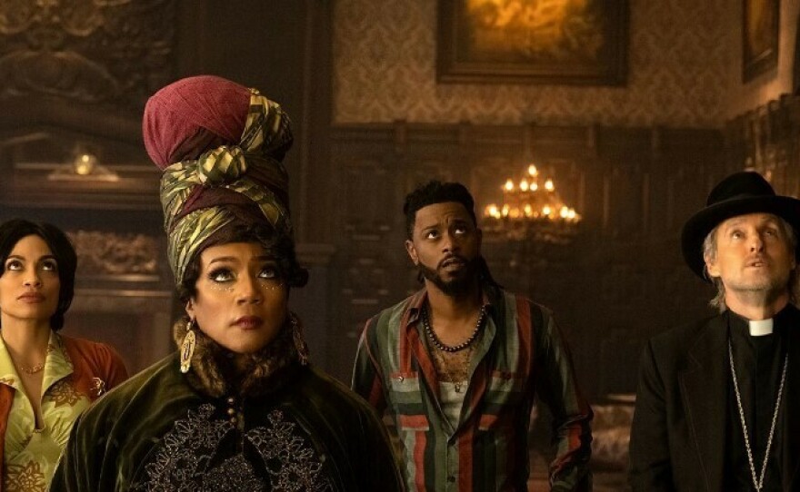 From left, Rosario Dawson, Tiffany Haddish, LaKeith Stanfield and Owen Wilson in <em>Haunted Mansion.</em>