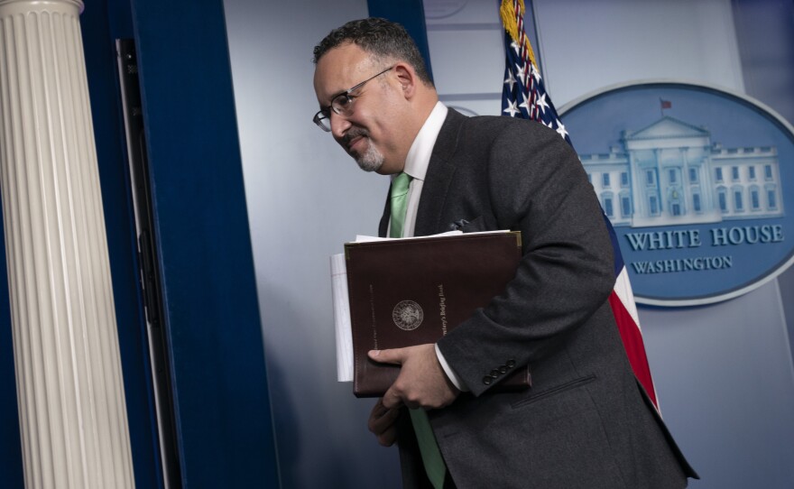 U.S. Education Secretary Miguel Cardona, pictured here in March, begins a back-to-school tour of the Midwest on Monday.