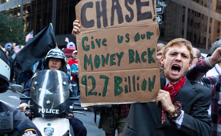 <p>As many as 1,000 Occupy Wall Street protesters marched to a Chase bank in New York's financial district to decry corporate greed.</p>