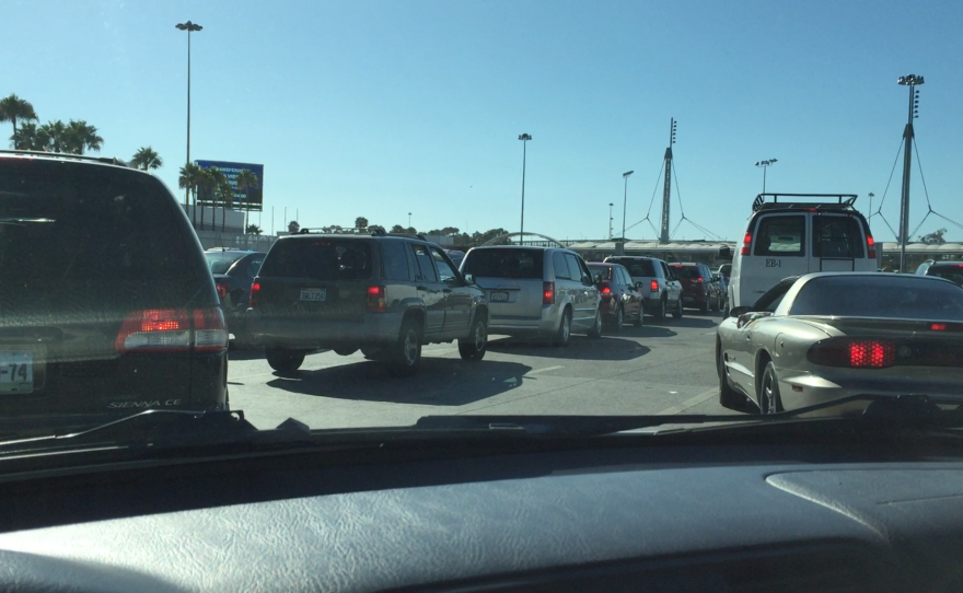 Bridget Bohorquez records the long line at the San Ysidro Port of Entry during a routine crossing, July 22, 2016.