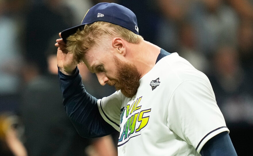 Tampa Bay Rays pitcher Cam Booser leaves the game during the fifth inning of Game 3 of baseball's World Series, Monday, Oct. 26, 2026, in St. Petersburg, Fla., between the Milwaukee Brewers and the Tampa Bay Rays.