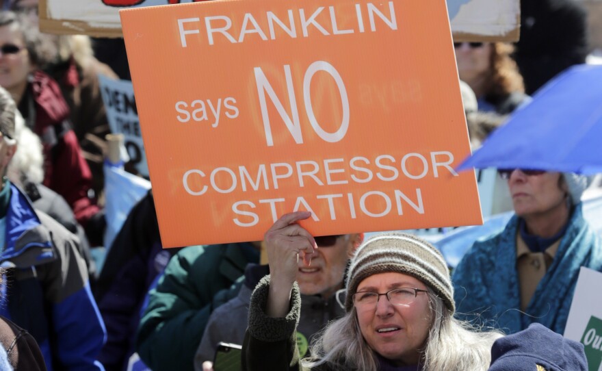 Environmental groups opposing the Constitution Pipeline rally outside the state Capitol on Tuesday, April 5, 2016, in Albany, N.Y.