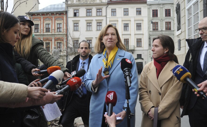 The acting U.S. ambassador to Ukraine, Kristina Kvien, speaks to media in Lviv, Ukraine, on Tuesday. The U.S. has relocated the embassy from the capital Kyiv to the western city of Lviv, citing the buildup of Russian forces on Ukraine's borders. An estimated 20,000 or more Americans have been living in Ukraine. Many have left, but some say they'll remain even if war breaks out.