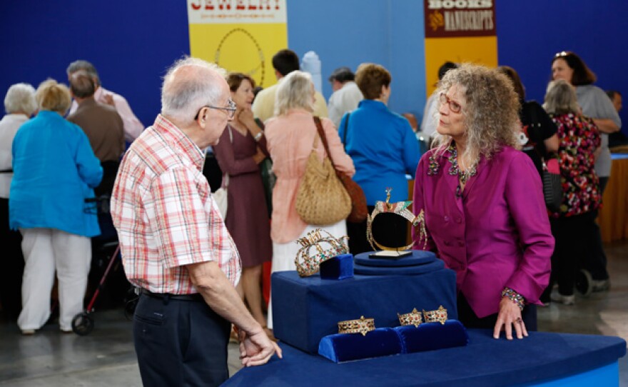 Rosalie Sayyah (right) appraises a Mardi Gras jewelry suite, ca. 1920 for $3,300 to $3,400 in Baton Rouge, La.