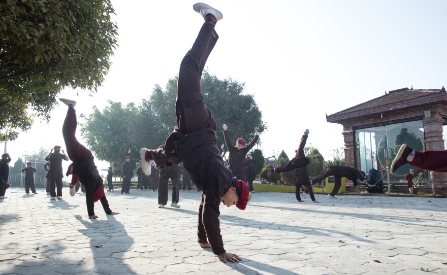Nuns practice kung fu as a part of their daily routine at the Druk Amitabha Mountain nunnery in Kathmandu, Nepal.