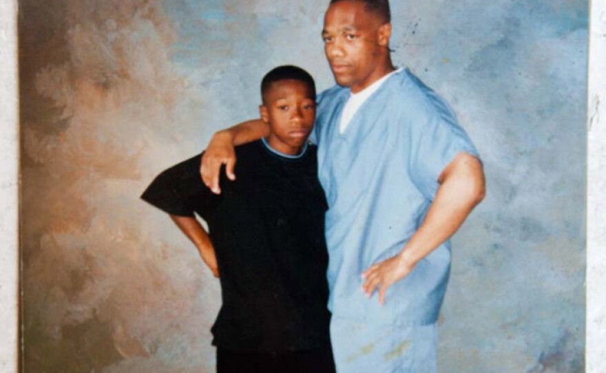 Chris Turner stands with his son, Chris Elliott, at the U.S. Penitentiary in Allenwood, Pa., about 16 years ago.