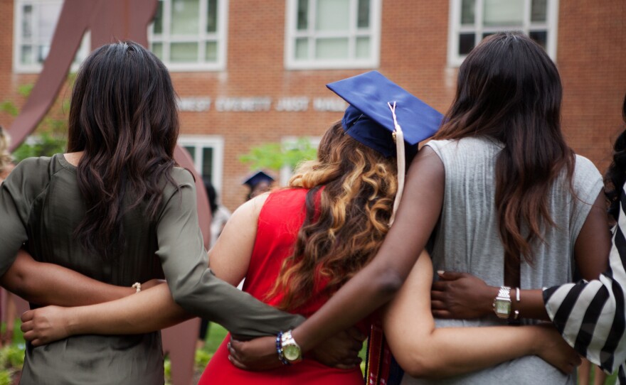 Members of a Howard University sorority gather to sing and dance and celebrate their graduation on Saturday.