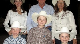 A family that participates in team penning poses for a photo after the Saturday afternoon Cattle Call performance, Nov. 12, 2016. Top row, left to right: Brett Leavitt, Steve Reeves and Julie Reeves. Bottom row, left to right: Jake Leavitt, 8, Cole Leavittt, 10, and Levi Leavitt, 5.