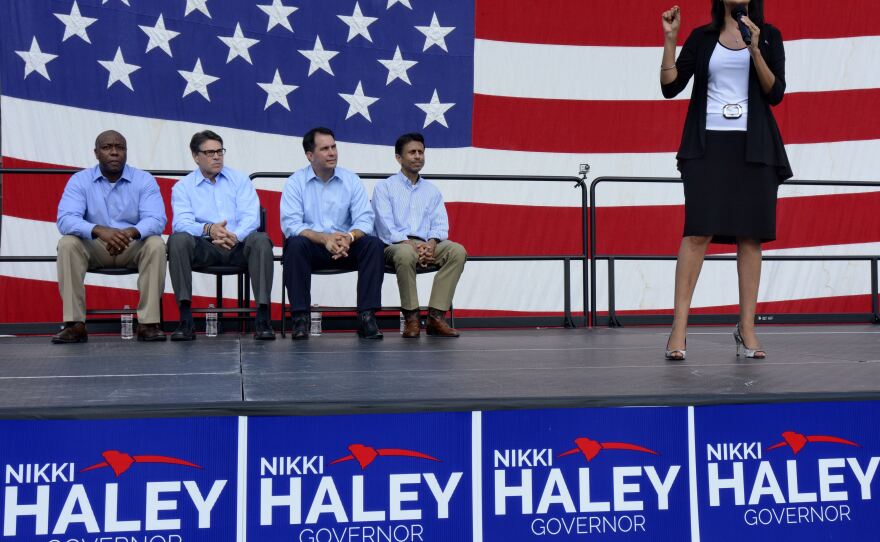 Republican South Carolina Gov. Nikki Haley announcing her candidacy for a second term in August, with South Carolina Sen. Tim Scott (from left), Govs. Rick Perry of Texas, Scott Walker of Wisconsin, and Bobby Jindal of Louisiana.