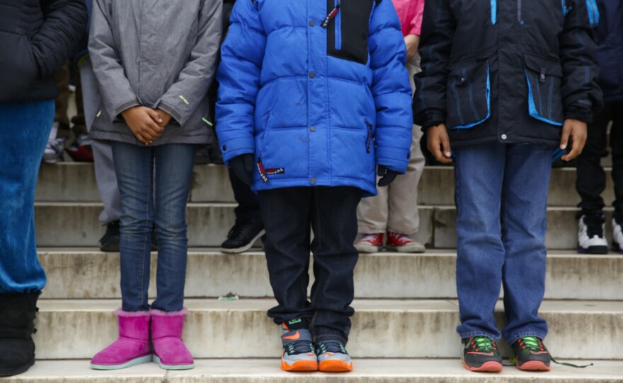 Each child memorized one small phrase from Martin Luther King, Jr.'s speech. They're standing in the order that they will deliver their line.