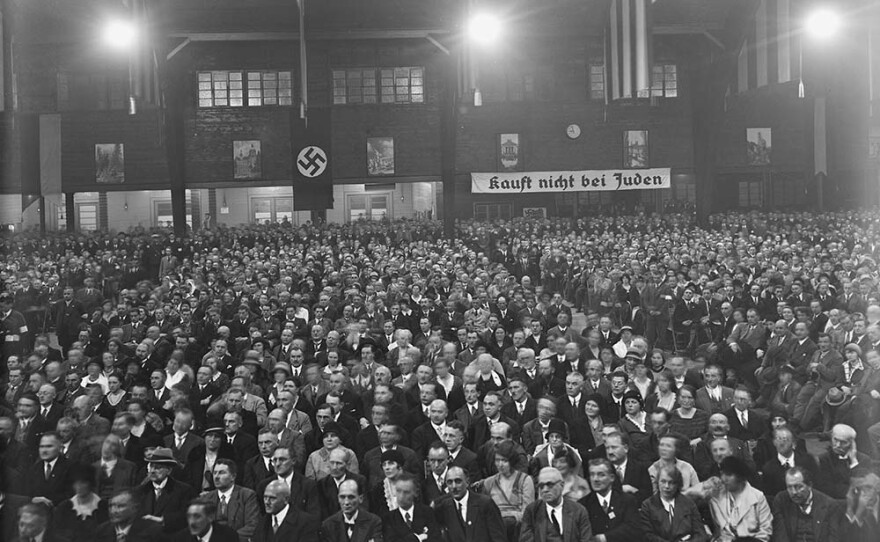 Nazi party meeting or rally. log back bed