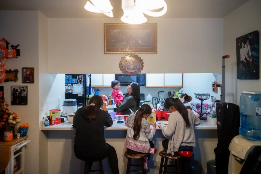 Ivonne Sonato-Vega says expanding child tax credits would help families like hers. In this undated image, she and her children have breakfast in their home in Santa Rosa.