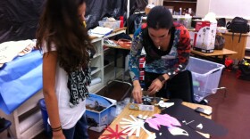 Lily Correa (left) and Karla Duarte work with construction paper that came to life in teen dating violence public service announcement at Montgomery Middle School, Nov. 28, 2012.