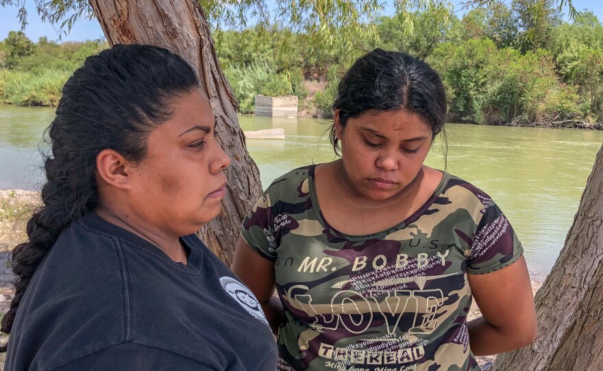 Nora Isabel Gallegos, left, stands with her daughter Priscila Arévalo in the riverside park in Nuevo Laredo, Mexico, where her husband Guillermo was killed by the Border Patrol seven years ago.