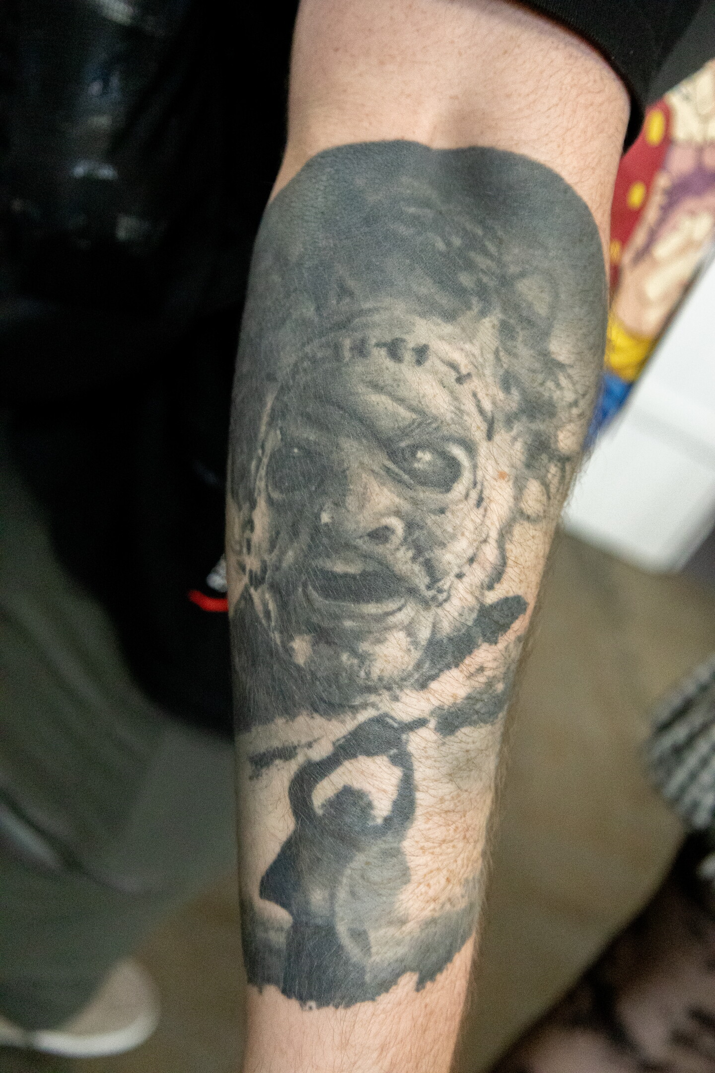 Leatherface from "The Texas Chainsaw Massacre" is displayed on the forearm of an attendee at Comic-Con, July 23, 2026.