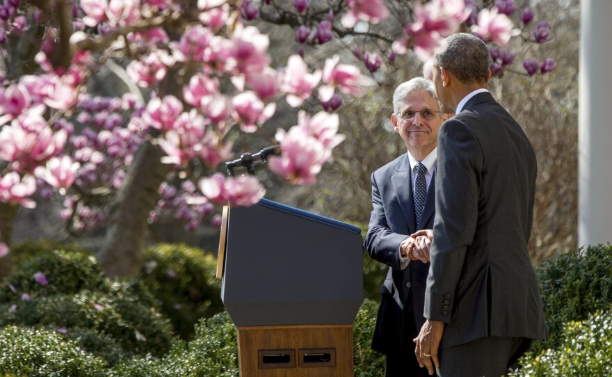 Supreme Court nominee Merrick Garland shakes hands with President Obama in the Rose Garden of the White House on March 16.