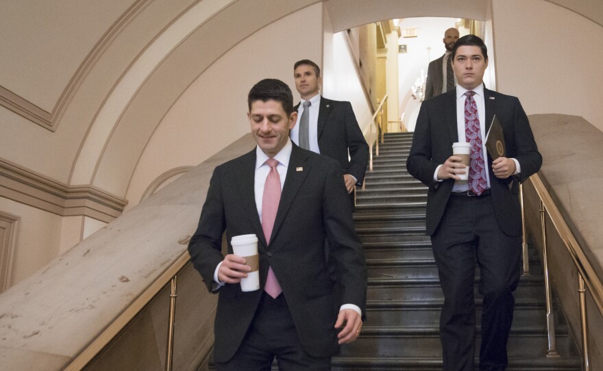 House Speaker Paul Ryan walks through the Capitol