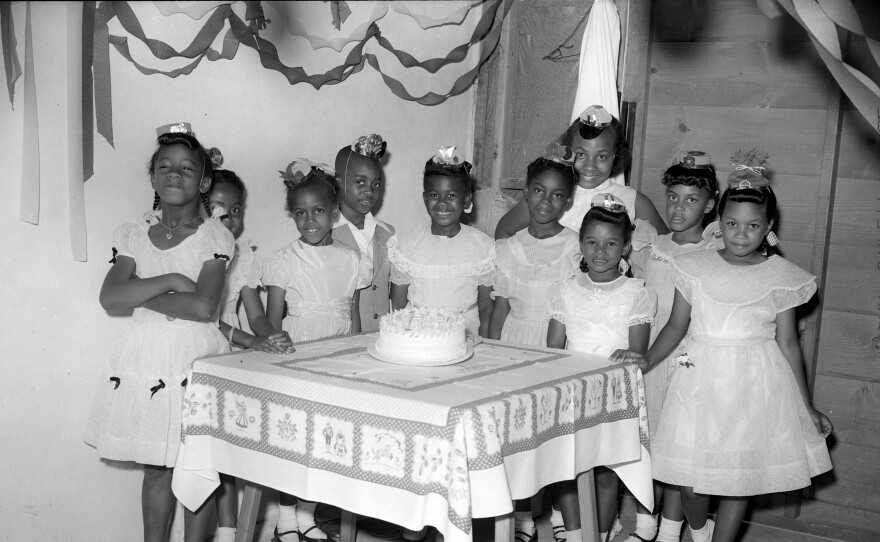 Janette Bowser's 6th birthday party, 1950. The children as identified in 2011 (left to right): Gwendolyn Marshall, Jewelene "Cookie" Williams, Katie Bartley, Arline Bartley, Janette "Blossom" Bowser, unknown, Belulah "Faye" Jones, Lorraine Foster, Alicia Summers, and Lorraine Foster's sister.