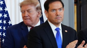 President Donald Trump walks past Secretary of State Marco Rubio as he arrives for a roundtable on the American mining industry, Friday, Aug. 7, 2026, at the State Department in Washington.