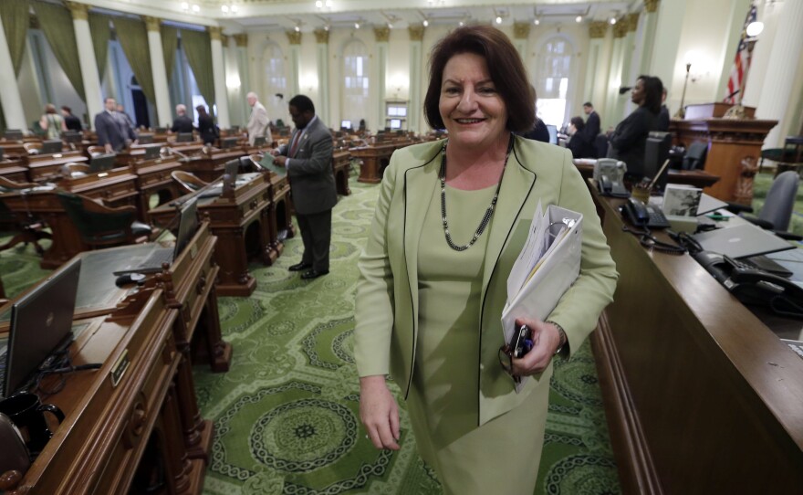 Assembly Speaker Toni Atkins, D-San Diego, leaves the Assembly at the Capitol in Sacramento, Calif., March 17, 2014.