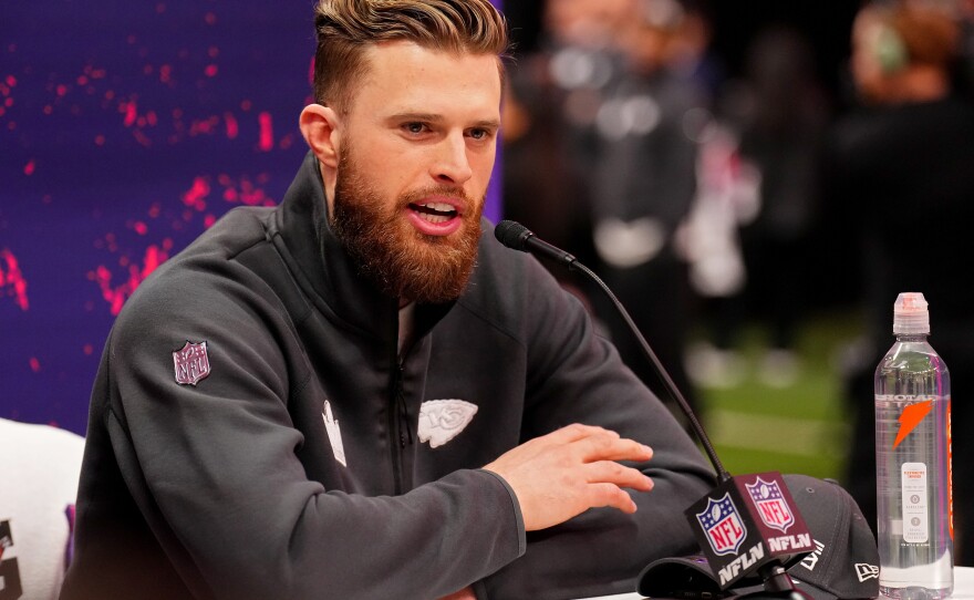 Kansas City Chiefs player Harrison Butker, pictured at a press conference in February, is in hot water for his recent commencement speech at Benedictine College in Kansas.