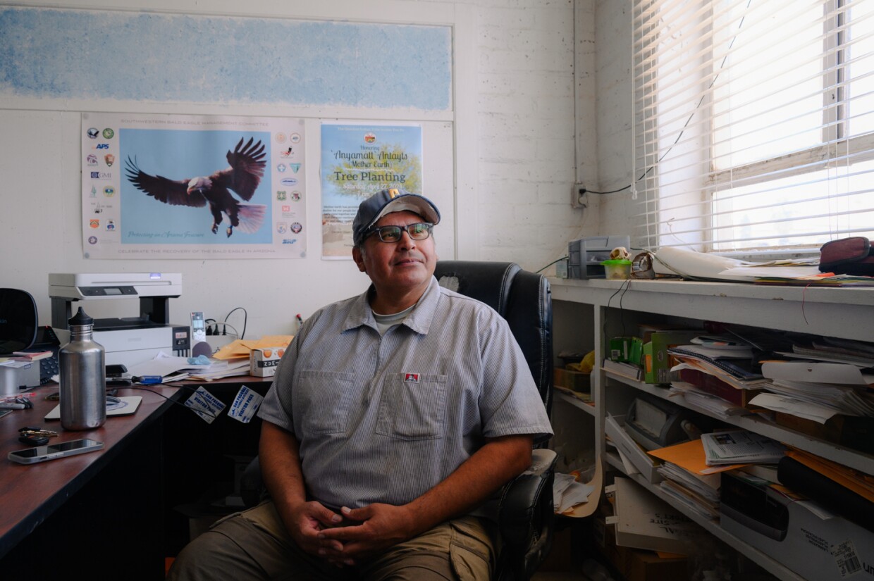Chase Choate, environmental director of the Quechan Tribe, sits for a portrait at his office on the Quechan Reservation in Imperial County on April 27, 2024. The tribe is working to restore hundreds of native trees along the banks of the Colorado River.