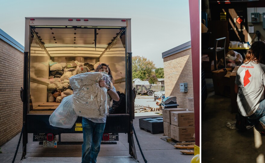 A truck arrives at the armory full of blankets. The donations came from a town in northern Wisconsin.