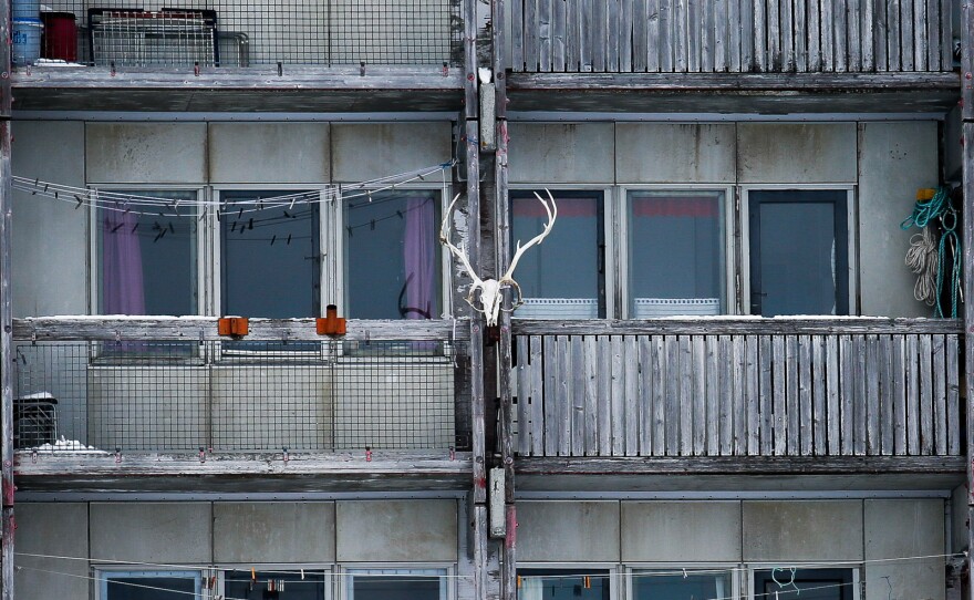 A reindeer skull ornaments a Nuuk apartment block.