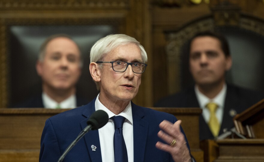 Wisconsin Gov. Tony Evers, a Democrat, delivers the State of the State address on Jan. 22. On Thursday, a Wisconsin county judge restored the governor's powers that had been restricted by Republicans during a lame-duck session.