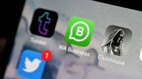 This photo illustration taken on July 14, 2021, shows the Clubhouse app icon on a mobile phone screen. The social audio app announced Wednesday it will not be attending this year's SXSW conference in Austin, Texas, given the controversies surrounding the state's transgender laws.