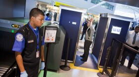 TSA officers give a demonstration of the first Advanced Imaging Technology unit at John F. Kennedy International Airport's Terminal 8 passenger security checkpoint on October 22, 2010 in the Queens borough of New York City.