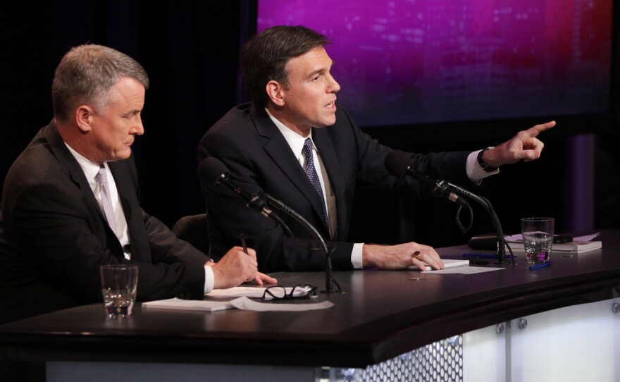 The Wall Street Journal's Bret Stephens (right) and Michael Doran of the Brookings Institution argue against the motion, "Flexing America's Muscles In The Middle East Will Make Things Worse."