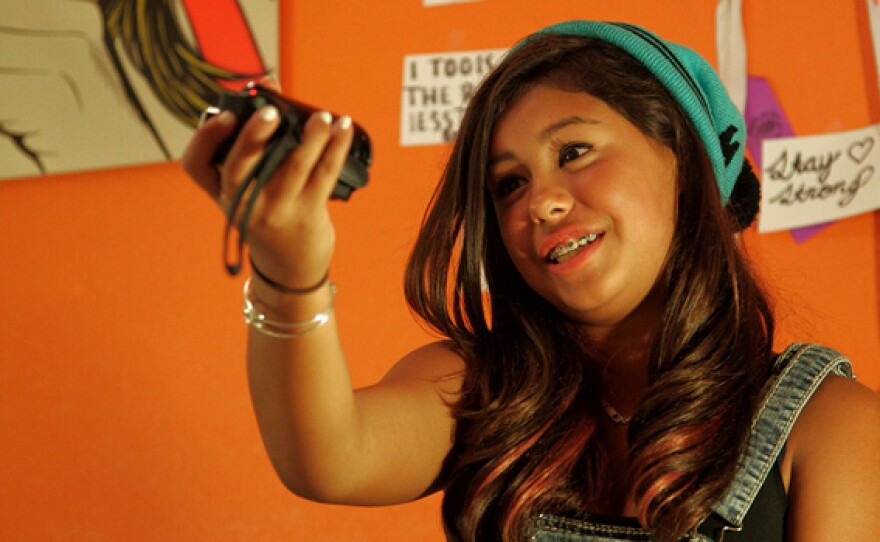 Signature image of a teen for "Generation Like."