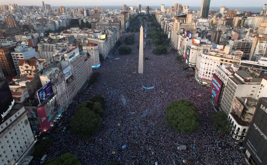 In this aerial view, Argentina's fans celebrate their team's 2022 World Cup win over defending champions France at the Obelisk in Buenos Aires on Sunday, Dec. 18.