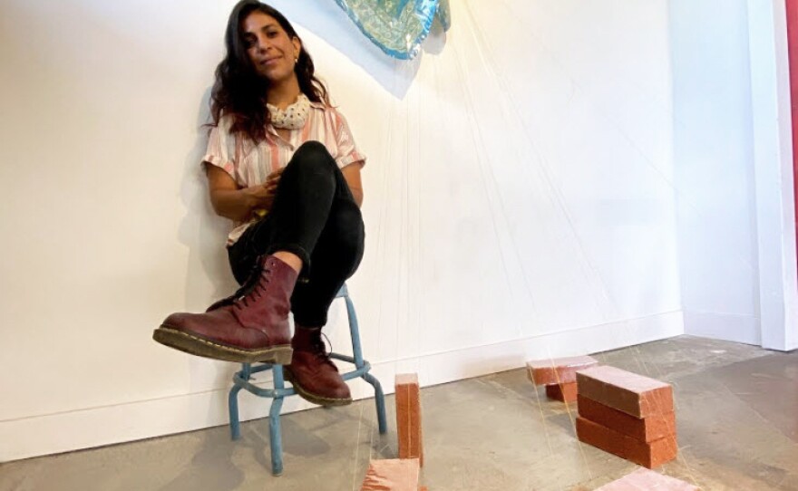 Visual artist Nassem Navab is pictured in her artist-in-residence space at Art Produce gallery in May 2020.
