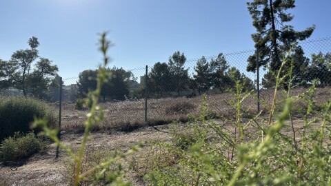 This empty CalTrans lot at the corner of Sweetwater Road and Troy Street could soon be the home of new sleeping cabins. The county aims to build 60 units that could shelter one to two people each. Photo taken Oct. 28, 2025.