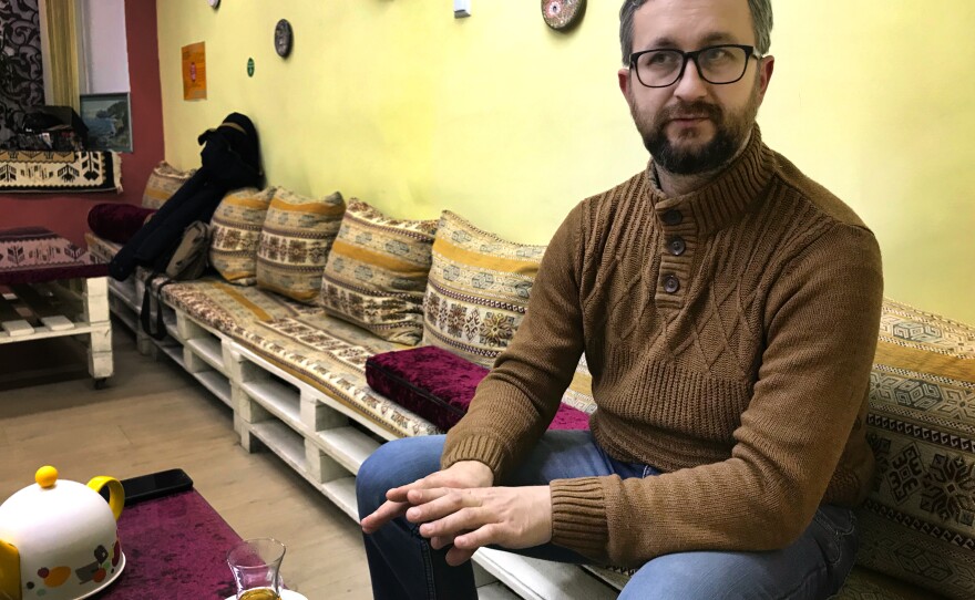 Nariman Dzhelyal, a Crimean Tatar leader, in a cafe in Crimea's capital Simferopol last month. He has remained in Crimea despite pressure from the Russian authorities.