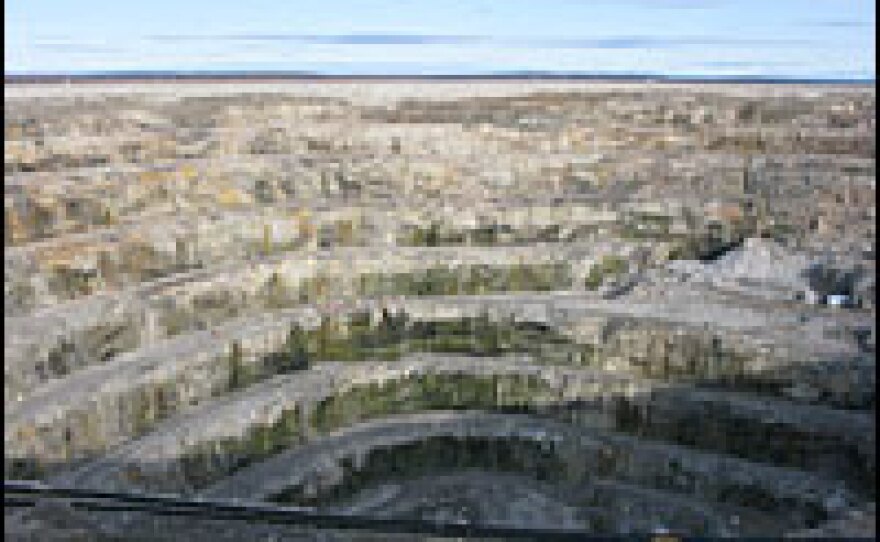 Diavik's pit mine in Canada's Northwest Territories is made of a conical spiral of steps, or "benches." Because of the strength of the rock in this mine, each step is about 100 feet tall.