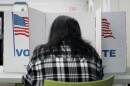 A person marks their ballot at a polling place in Falls Church, Va., during early voting for the 2024 election.