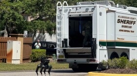 The Hillsborough County Sheriff's Office responds to a neighborhood close to the University of South Florida campus, Friday, April 24, 2026 in Tampa, Fla.