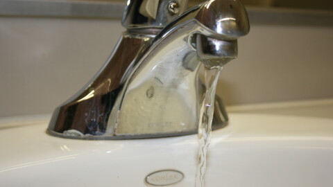 An undated file photo of water running from a faucet.